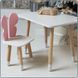 Children's white rectangular table and chair with a pink butterfly and white seat